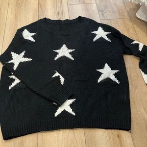 Cozy black sweater with white stars
